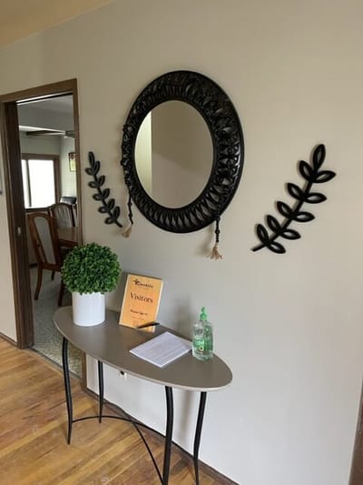 Entryway with a mirror and decor
