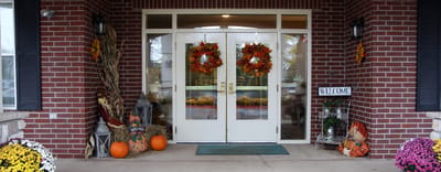 Entrance of Bickford of Rockford decorated for fall