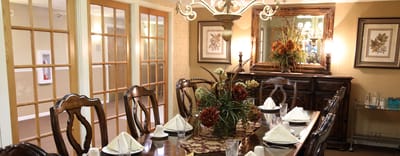 Elegant dining room with a set table and decor