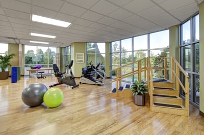 Bright, spacious fitness center with exercise equipment