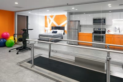 A modern therapy room with exercise equipment
