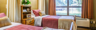 Avantara Watertown, Nursing Home in Watertown, SD — Cozy shared bedroom with two neatly made beds