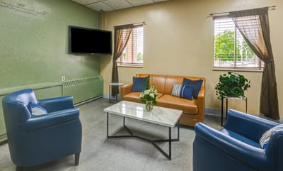 Cozy common area with seating and plants