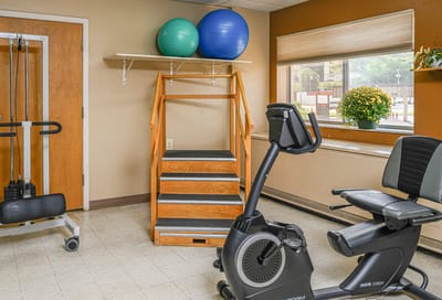 Interior view of a fitness area with exercise equipment