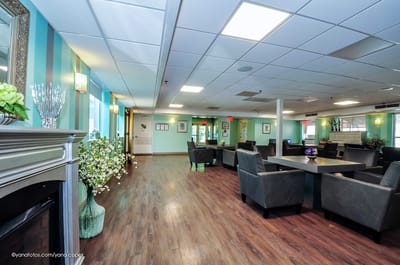 Bright common area with seating and decor