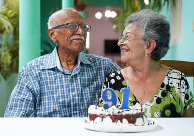 Residents celebrating a birthday with cake