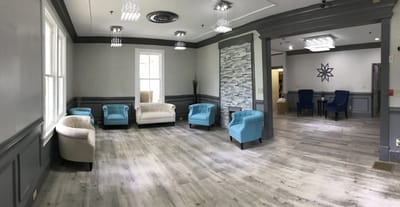 Modern common area with seating and decorative features