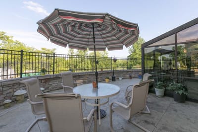 Outdoor seating area with a patio umbrella