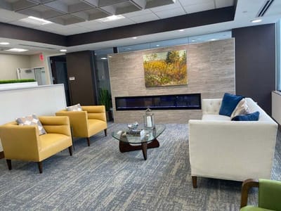 Cozy common area with seating and artwork