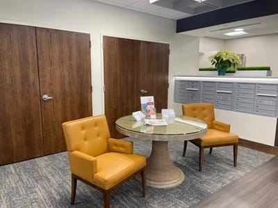 Interior lobby with seating and mailboxes