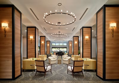 Bright and spacious interior lounge area with seating.