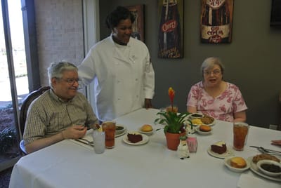 Residents enjoying a meal in the dining area