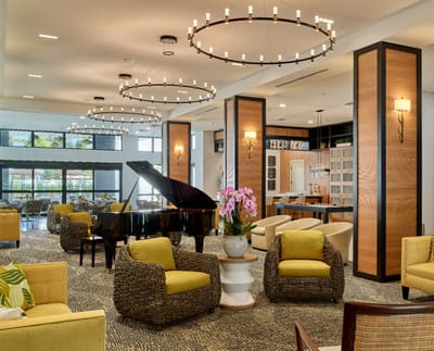 Inviting common area with piano and seating