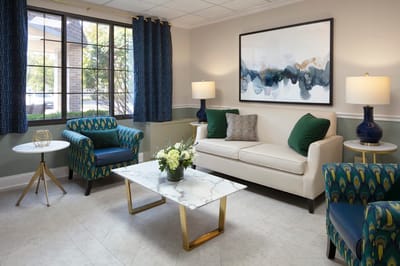 Bright common area with seating and decor