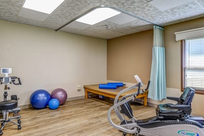 Interior view of a therapy room with equipment