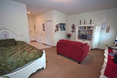 Cozy interior of a resident's room with furniture