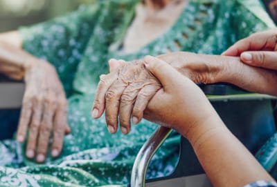 Avamere Rehabilitation of Eugene, nursing home in Eugene, OR — Hands of an elderly person being held tenderly