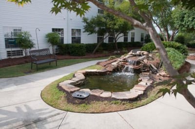 Beautiful garden with a water feature and seating area