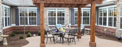 Patio area with seating and decorative features