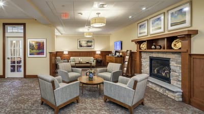 Comfortable lounge area with fireplace and seating