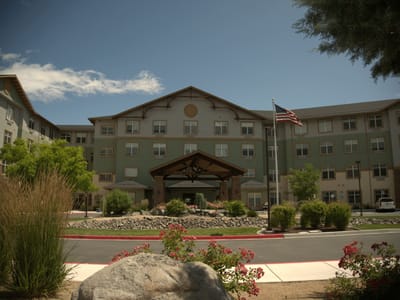 Exterior view of Mountain Lakes Estates with landscaping