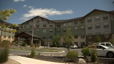 Exterior view of Mountain Lakes Estates with landscaped grounds