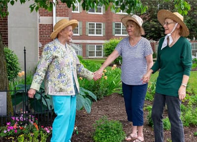 Residents enjoying a garden area together
