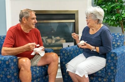 Residents enjoying ice cream in a common area