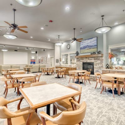 Bright dining area with tables and chairs
