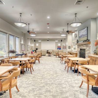 Bright common area with seating for residents