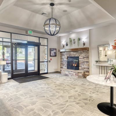 Welcoming common area with a fireplace and cozy seating