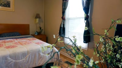 Cozy resident bedroom with floral decorations
