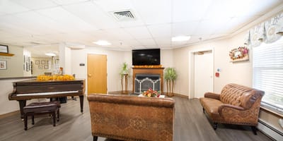 Interior view of a cozy common area with seating