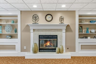 Cozy common area with fireplace and decorative elements