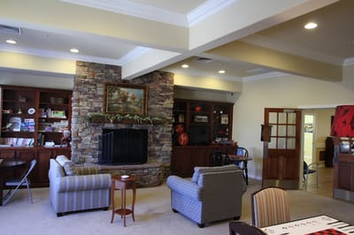 Cozy common area with seating and fireplace