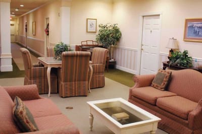 Interior common area with seating and dining table
