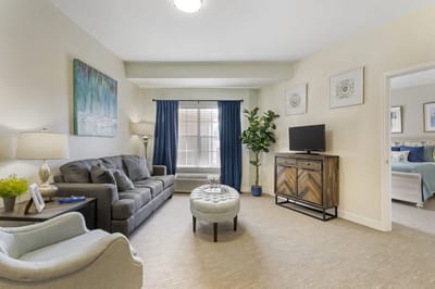 A cozy interior of a resident room with furniture