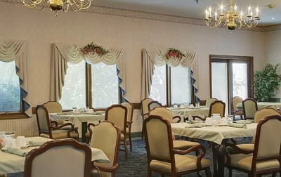 Bright dining area with tables and chairs