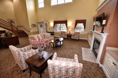 Bright lounge area with comfortable seating and decor