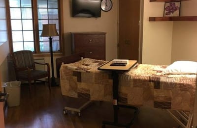 Interior view of a resident's room with furniture