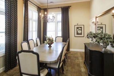 Bright dining room with a long table and decorative elements