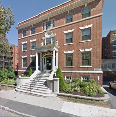 Exterior view of Saint Luke's Home featuring entrance steps