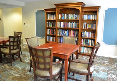 Common area with bookshelves and tables