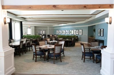 Bright dining room with tables and chairs