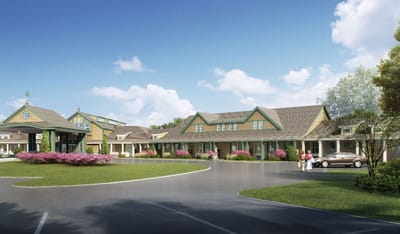 Exterior view of the Thrive at Augusta facility with landscaping and residents.