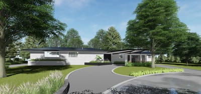 Exterior view of a senior care facility surrounded by trees