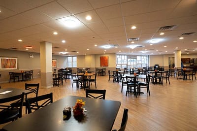 Spacious dining room with tables and chairs