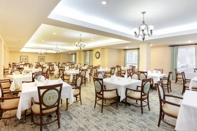 Dining room with tables set for meals