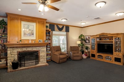 Cozy common area with seating and a fireplace