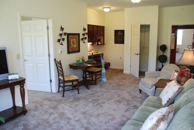 Bright interior of a resident's room with furniture